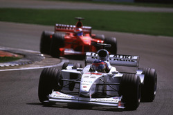 Jacques Villeneuve, BAR leads Michael Schumacher, Ferrari