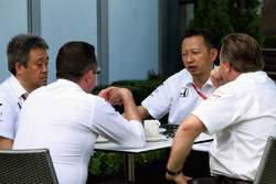 Eric Boullier, McLaren Racing Director and Zak Brown, McLaren Executive Director with Yusuke Hasegawa, Head of Honda F1 Programme