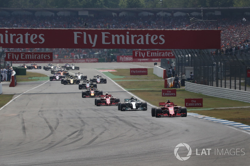 Sebastian Vettel, Ferrari SF71H leads on lap one