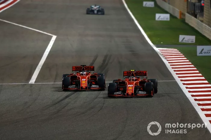 Sebastian Vettel, Ferrari SF90, battles with Charles Leclerc, Ferrari SF90