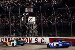 Denny Hamlin, Joe Gibbs Racing, Toyota Camry Offerpad and Kyle Larson, Hendrick Motorsports, Chevrolet Camaro HendrickCars.com on the finish line