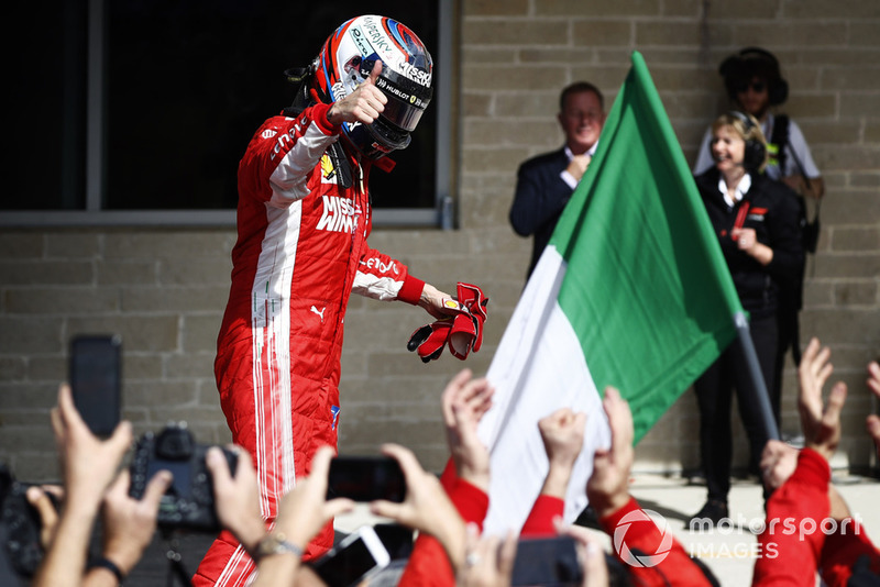 Kimi Raikkonen, Ferrari SF71H, celebrates after winning the race.