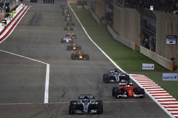Valtteri Bottas, Mercedes AMG F1 W08, leads Sebastian Vettel, Ferrari SF70H, and Lewis Hamilton, Mercedes AMG F1 W08