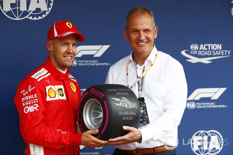 Sebastian Vettel, Ferrari, receives the Pirelli pole award