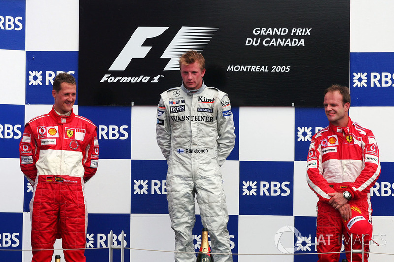 Podium: race winner Kimi Raikkonen, McLaren, second place Michael Schumacher, Ferrari, third place R