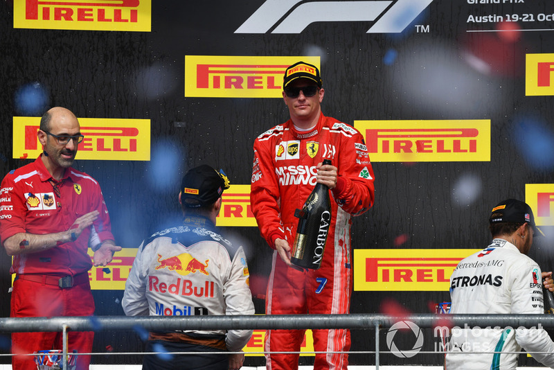 (L to R): Max Verstappen, Red Bull Racing, Carlo Santi, Ferrari Race Engineer, Race Winner Kimi Raikkonen, Ferrari and Lewis Hamilton, Mercedes AMG F1 celebrate on the podium with the champagne