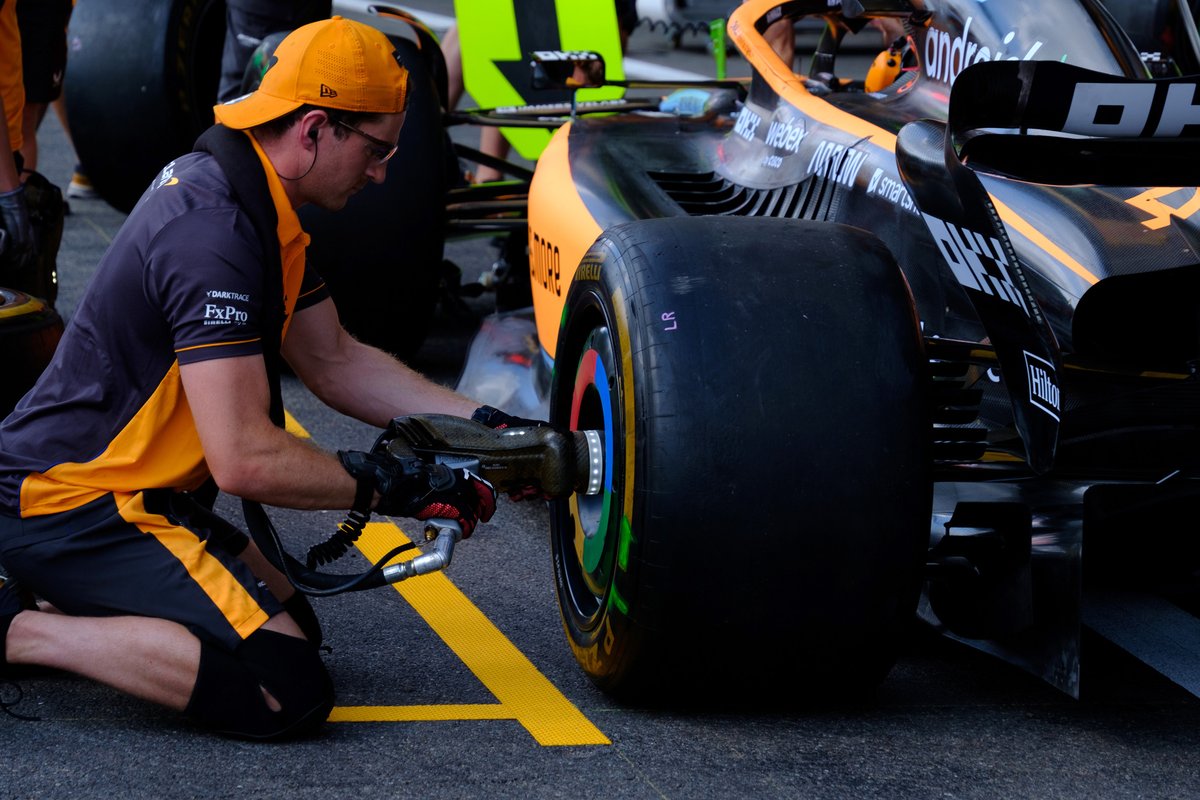 The McLaren crew practice a pitstop, a key human performance battleground in F1
