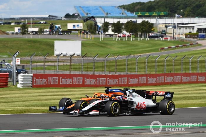 Romain Grosjean, Haas VF-20, Carlos Sainz Jr., McLaren MCL35