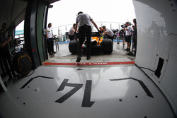Fernando Alonso, McLaren MCL33 Renault, is returned to the garage