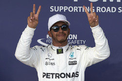 Polesitter Lewis Hamilton, Mercedes AMG F1, celebrates
