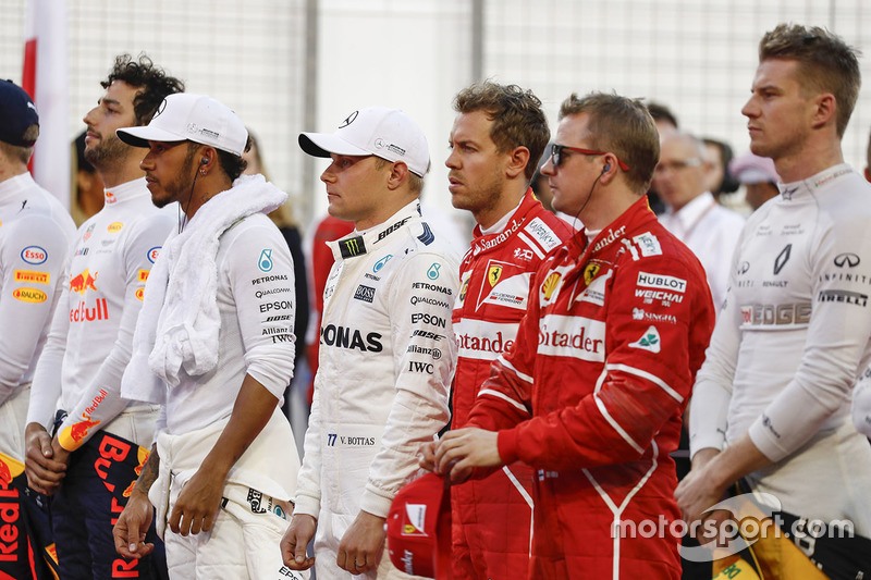 Daniel Ricciardo, Red Bull Racing,Lewis Hamilton, Mercedes AMG, Valtteri Bottas, Mercedes AMG, Sebastian Vettel, Ferrari, Kimi Raikkonen, Ferrari, and Nico Hulkenberg, Renault Sport F1 Team, line up for the national anthem