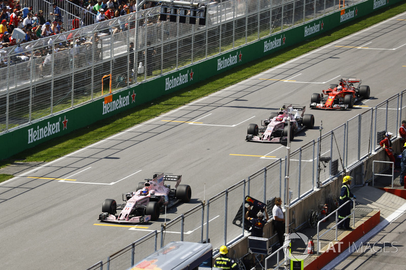 Sergio Perez, Sahara Force India F1 VJM10, Esteban Ocon, Sahara Force India F1 VJM10 and Sebastian Vettel, Ferrari SF70H