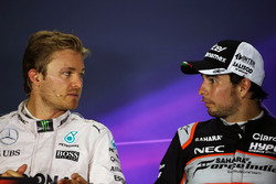 (L to R): Nico Rosberg, Mercedes AMG F1 with Sergio Perez, Sahara Force India F1 in the FIA Press Co
