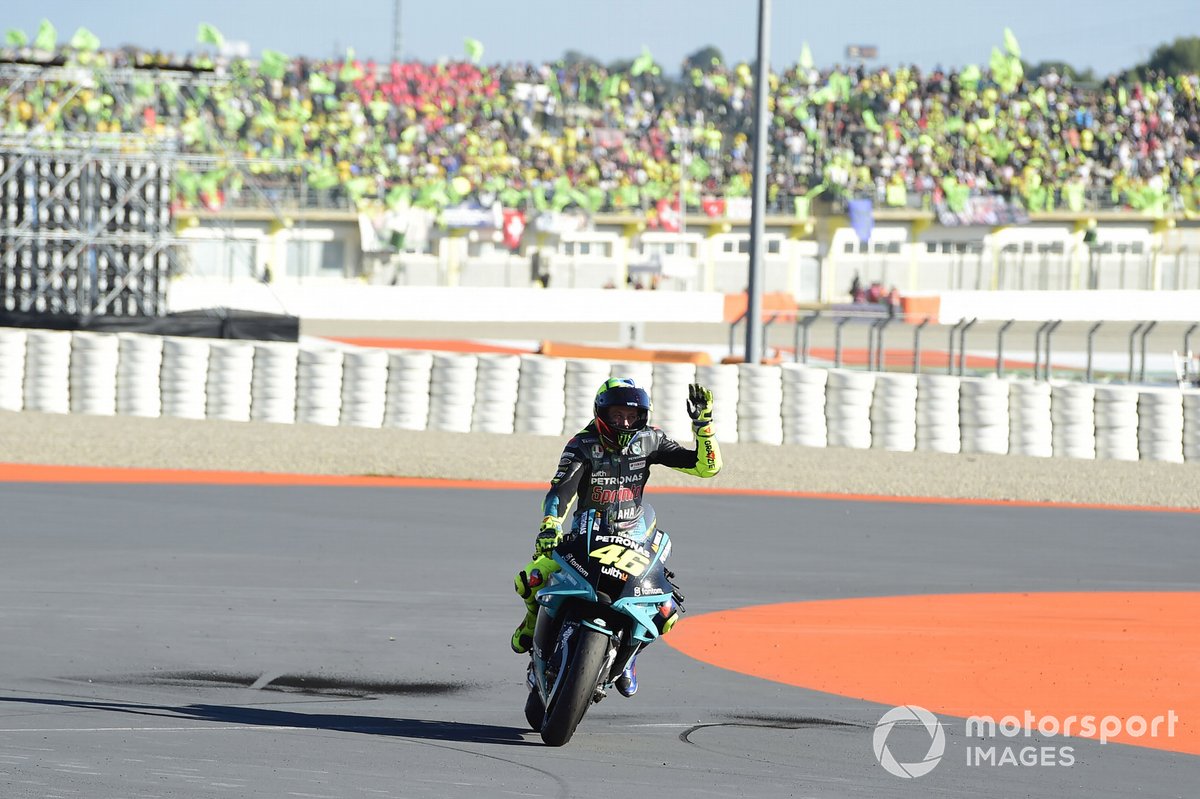 Valentino Rossi, Petronas Yamaha SRT, waves to fans after his final MotoGP race in the 2021 Valencia Grand Prix finals.