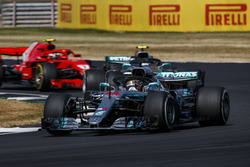 Lewis Hamilton, Mercedes AMG F1 W09, leads Valtteri Bottas, Mercedes AMG F1 W09, and Kimi Raikkonen, Ferrari SF71H