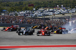 Sebastian Vettel, Ferrari SF70H, passes Lewis Hamilton, Mercedes AMG F1 W08, at the start