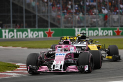 Esteban Ocon, Force India VJM11, leads Nico Hulkenberg, Renault Sport F1 Team R.S. 18