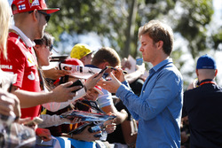 Nico Rosberg signs autographs for fans