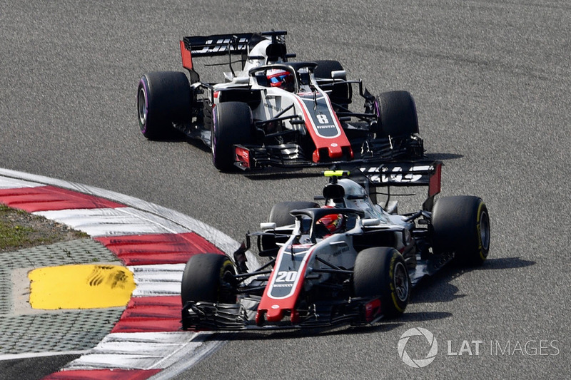 Kevin Magnussen, Haas F1 Team VF-18 and Romain Grosjean, Haas F1 Team VF-18