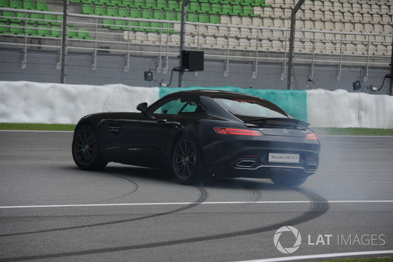 Lewis Hamilton, Mercedes AMG F1 in a Mercedes AMG GTS