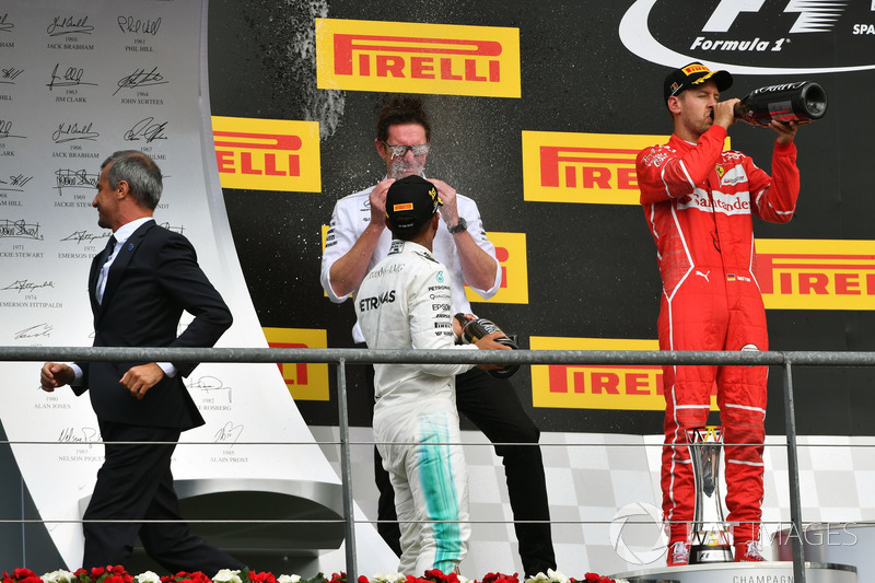 Andy Shovlin, Mercedes AMG F1 Engineer, Lewis Hamilton, Mercedes AMG F1 and Sebastian Vettel, Ferrari celebrate on the podium