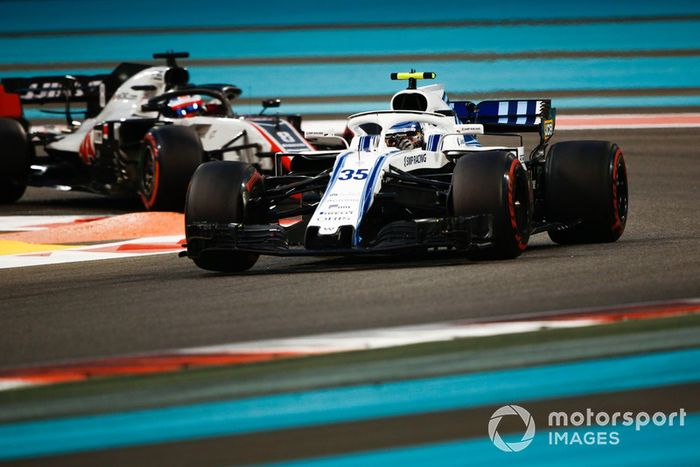 Sergey Sirotkin, Williams FW41 y Romain Grosjean, Haas F1 Team VF-18 