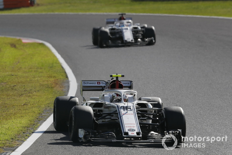 Charles Leclerc, Sauber C37 leads Marcus Ericsson, Sauber C37