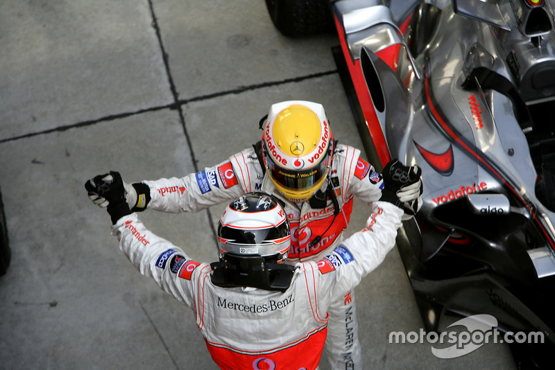 Fernando Alonso, McLaren MP4-22 Mercedes, 1st position, and team mate Lewis Hamilton, McLaren MP4-22 Mercedes. celebrate their McLaren one-two