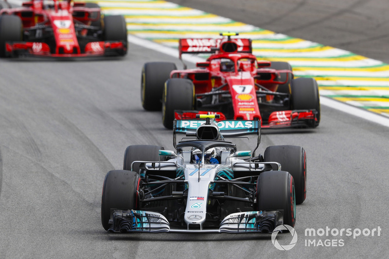 Valtteri Bottas, Mercedes AMG F1 W09 EQ Power+, leads Kimi Raikkonen, Ferrari SF71H, and Sebastian Vettel, Ferrari SF71H