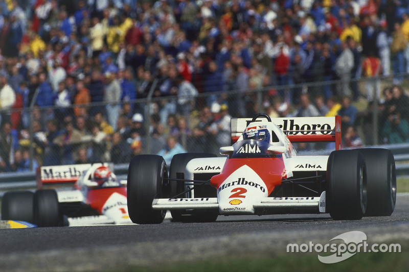 Alain Prost leads Niki Lauda, both McLaren MP4/2B TAG Porsche