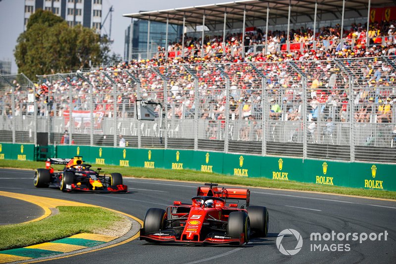 Sebastian Vettel, Ferrari SF90, leads Max Verstappen, Red Bull Racing RB15