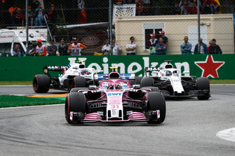 Esteban Ocon, Racing Point Force India VJM11, leads Lance Stroll, Williams FW41, and Sergey Sirotkin, Williams FW41