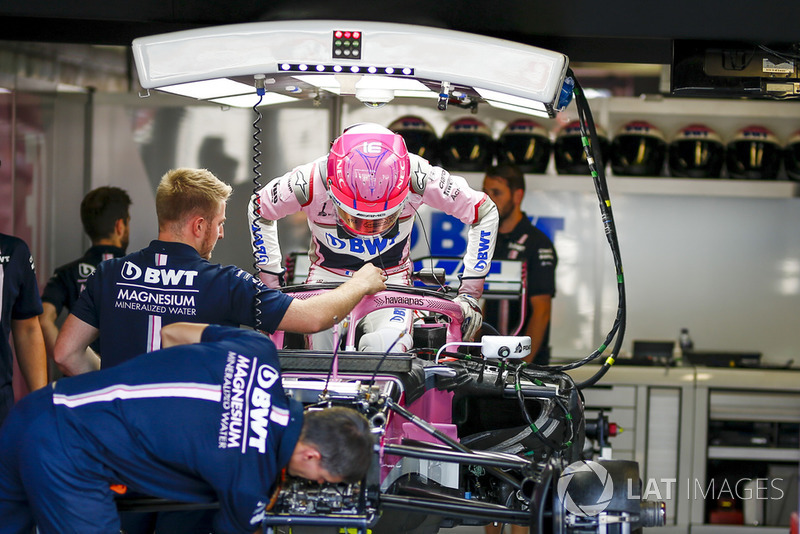 Esteban Ocon, Racing Point Force India F1 Team gets into his car