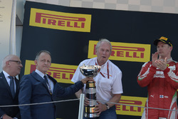 Dr Helmut Marko, Red Bull Motorsport Consultant celebrates on the podium