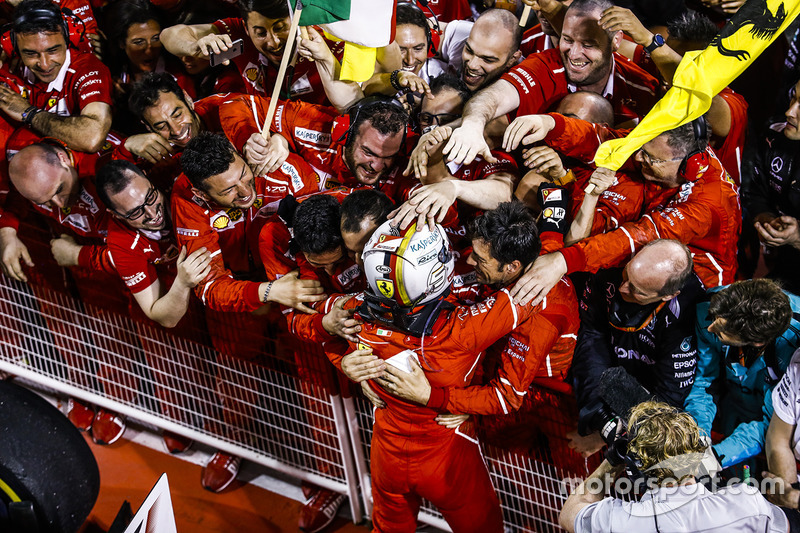 Race winner Sebastian Vettel, Ferrari, celebrates with his team in Parc Ferme