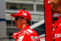 Kimi Raikkonen, Ferrari, heads back to the garage on foot after retiring