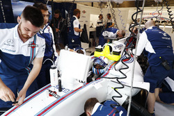 Mechanics are working on the car of Felipe Massa, Williams FW40