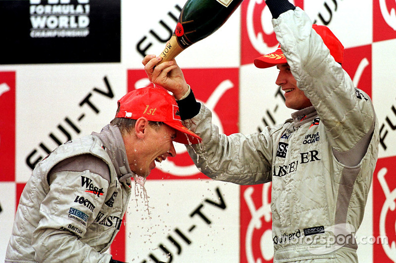 Podium:  David Coulthard and Mika Hakkinen celebrate