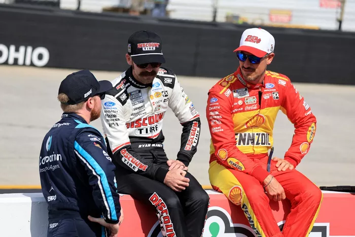 Tyler Reddick, 23XI Racing; Ryan Blaney, Team Penske; Joey Logano, Team Penske