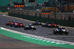 Stoffel Vandoorne, McLaren MCL33, Valtteri Bottas, Mercedes AMG F1 W09, Sergio Perez, Force India VJM11, Kimi Raikkonen, Ferrari SF71H, Brendon Hartley, Toro Rosso STR13, Fernando Alonso, McLaren MCL33, Sergey Sirotkin, Williams FW41, and Lance Stroll, Williams FW41, line up for practice starts