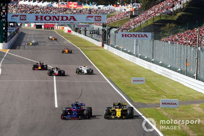 Brendon Hartley, Toro Rosso STR13, lucha con Carlos Sainz Jr., Renault Sport F1 Team R.S. 18, delante de Kevin Magnussen, Haas F1 Team VF-18, Charles Leclerc, Sauber C37, y Daniel Ricciardo, Red Bull Racing RB14