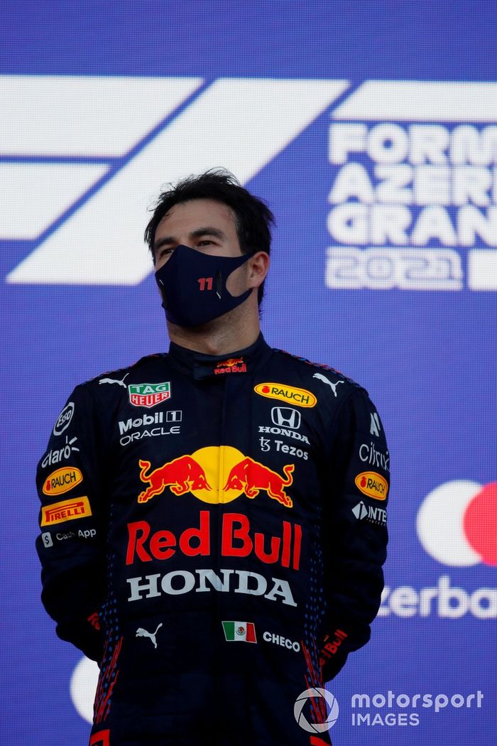 Podio: ganador de la carrera Sergio Pérez, Red Bull Racing