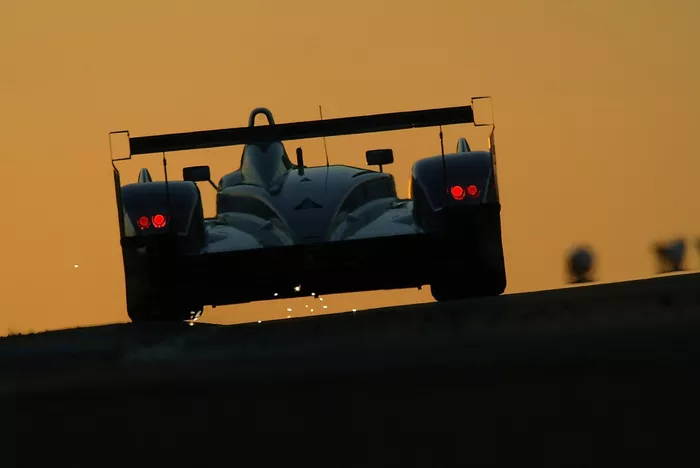 Sparks fly from the Audi as it goes under the Dunlop bridge in the early morning light