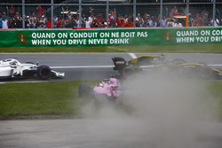 A sideways Sergio Perez, Force India VJM11, bounces over the grass after battling with Carlos Sainz Jr., Renault Sport F1 Team R.S. 18