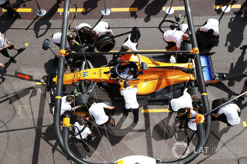 McLaren mechanics practice a pit stop on the Fernando Alonso McLaren MCL33