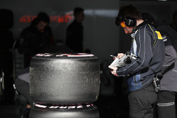 A Pirelli tyre technician at work
