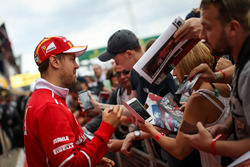 Sebastian Vettel, Ferrari signs autographs for the fans