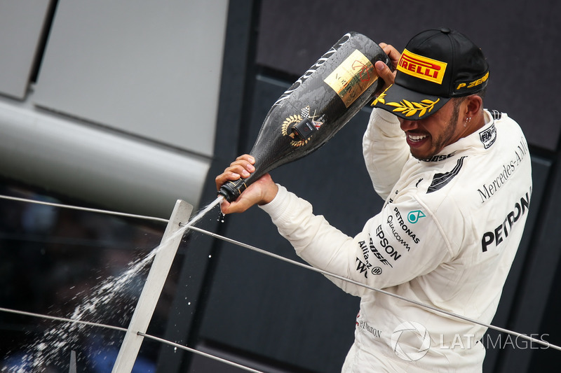 Race winner Lewis Hamilton, Mercedes AMG F1 celebrates on the podium