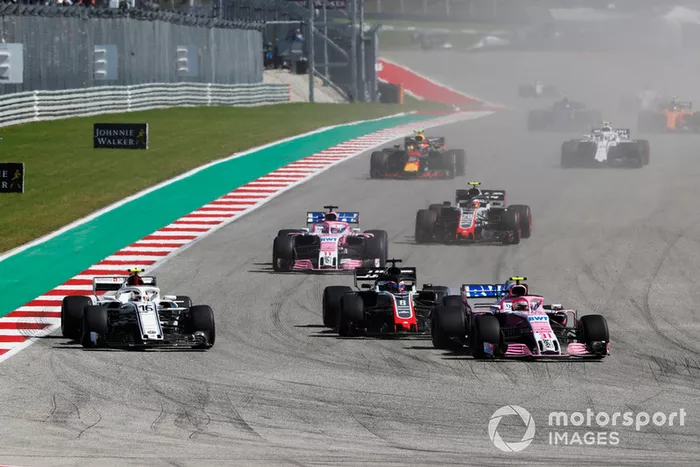 Esteban Ocon, Racing Point Force India VJM11, Charles Leclerc, Sauber C37 y Romain Grosjean, Haas F1 Team VF-18 battle 