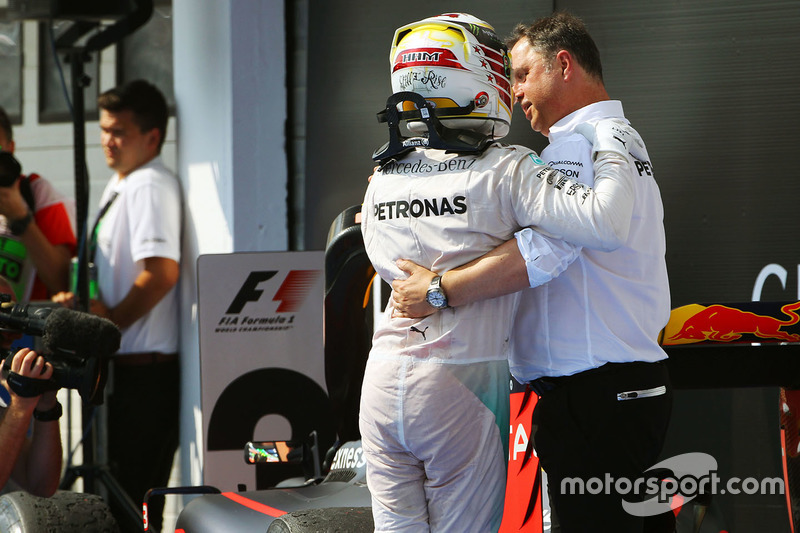 Race winner Lewis Hamilton, Mercedes AMG F1 celebrates in parc ferme with Ron Meadows, Mercedes GP Team Manager